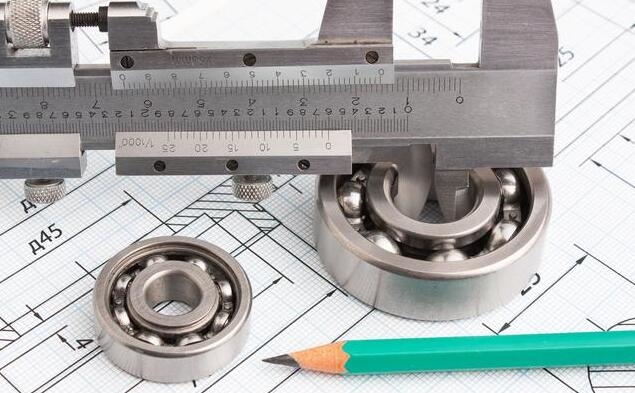 在机械设计中轴承与轴的配合,该用什么公差等级最合适